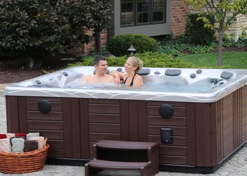 A couple relaxing in a hot tub